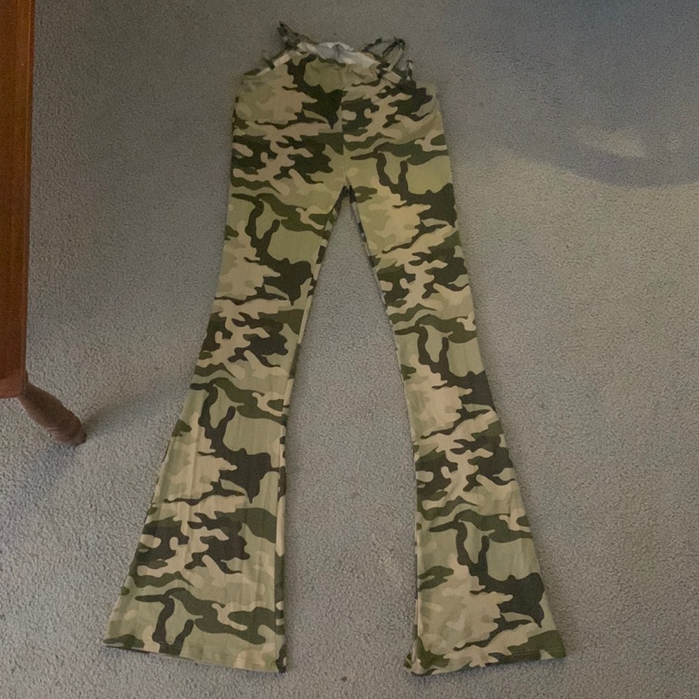 Urban Renewal, size small. Camouflage print. Color are shades of green and tan.